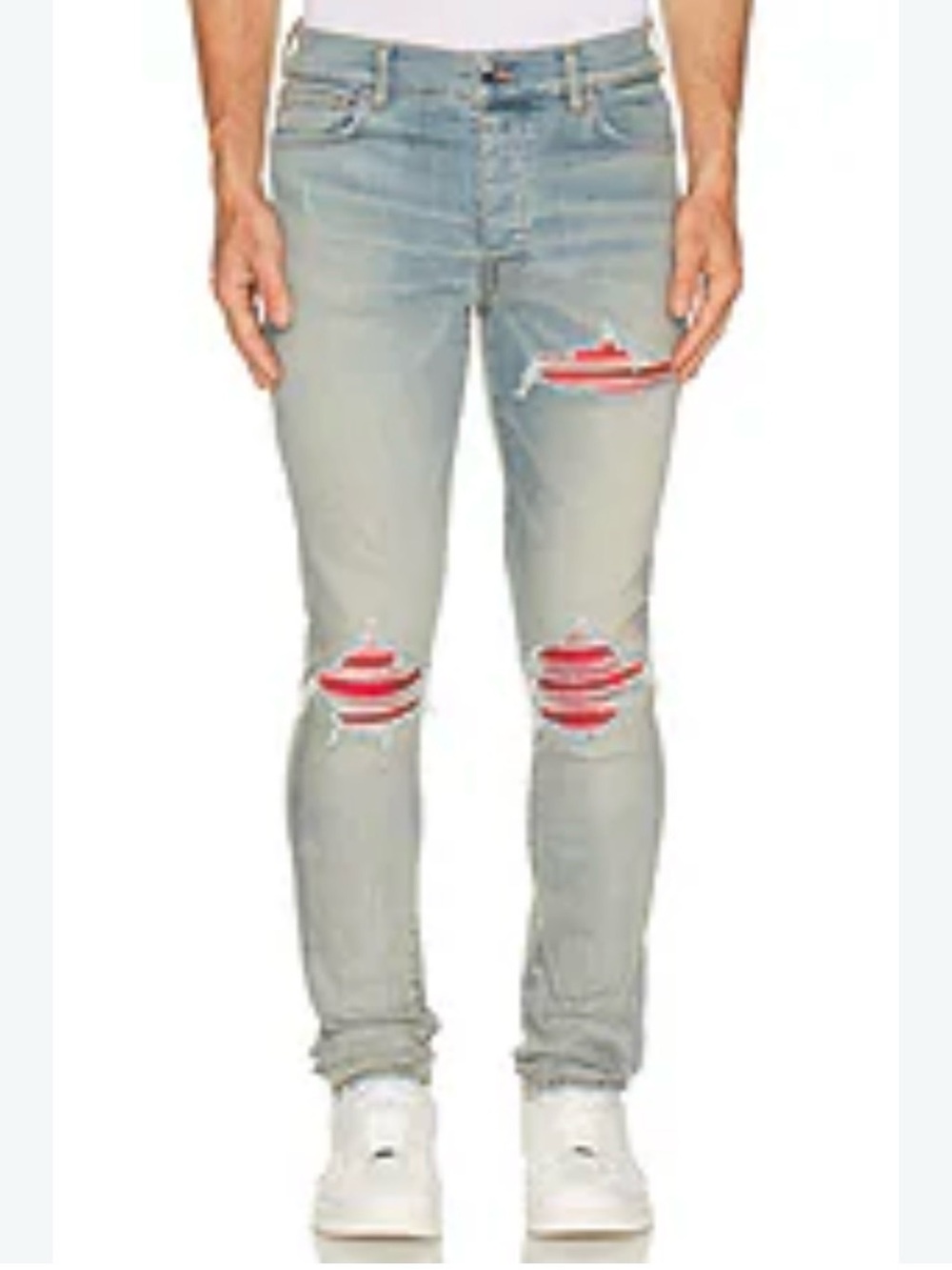 Amiri Light Wash Distressed Men’s Slim Jeans with Red Patch Detail